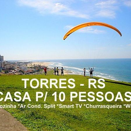 Casa De 2 Quartos Com 2 Ares-Condicionados Em Torres-Rs - Na Mais Bela Praia Gaucha - Cozinha - Banheiro - Tv Smart 32 E Wi-Fi - Estacionamento - Anfitria Superhost No Bnb Βίλα Εξωτερικό φωτογραφία