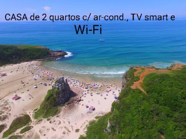 Casa De 2 Quartos Com 2 Ares-Condicionados Em Torres-Rs - Na Mais Bela Praia Gaucha - Cozinha - Banheiro - Tv Smart 32 E Wi-Fi - Estacionamento - Anfitria Superhost No Bnb Βίλα Εξωτερικό φωτογραφία