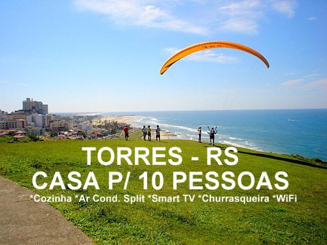 Casa De 2 Quartos Com 2 Ares-Condicionados Em Torres-Rs - Na Mais Bela Praia Gaucha - Cozinha - Banheiro - Tv Smart 32 E Wi-Fi - Estacionamento - Anfitria Superhost No Bnb Βίλα Εξωτερικό φωτογραφία